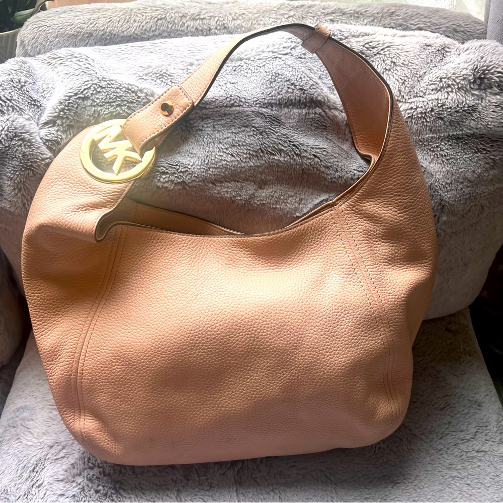 Blush Leather Michael Kors hobo bag.  Gently used.  Good condition
